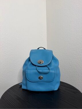 coach blue turnlock backpack Convertible Mini We're loving this little denim